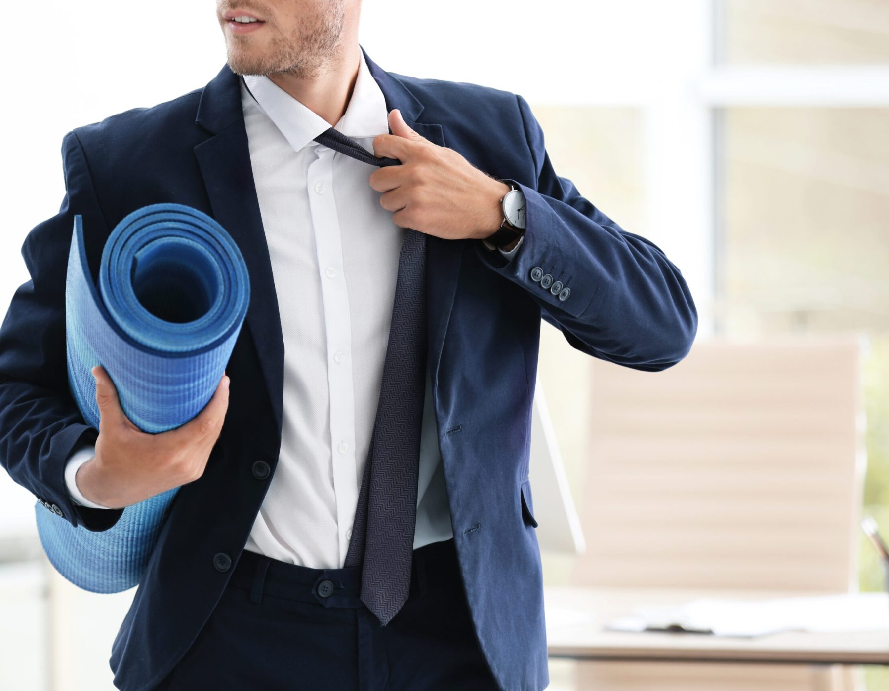 Young,Handsome,Businessman,Holding,Yoga,Mat,In,Office.,Gym,After